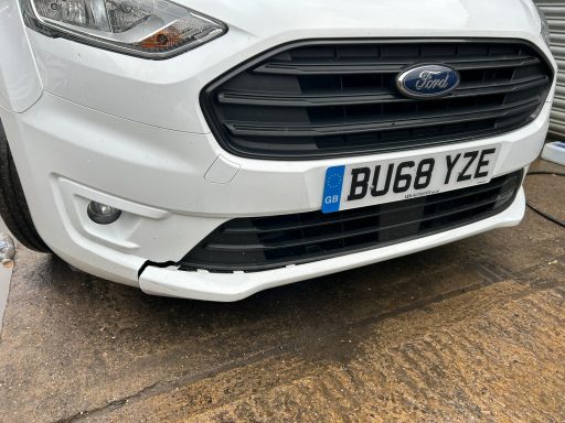 White Ford van front with licence plate BU68 YZE, displaying the lower bumper area.